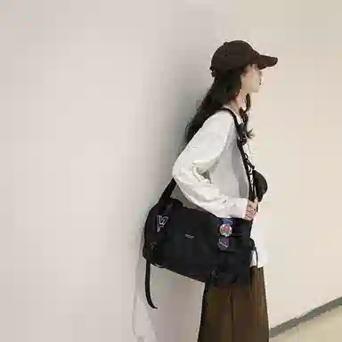 醇龙  尼龙男女通用黑色背包斜挎包大容量单肩包邮差包