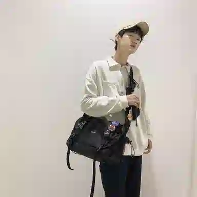 醇龙  尼龙男女通用黑色背包斜挎包大容量单肩包邮差包
