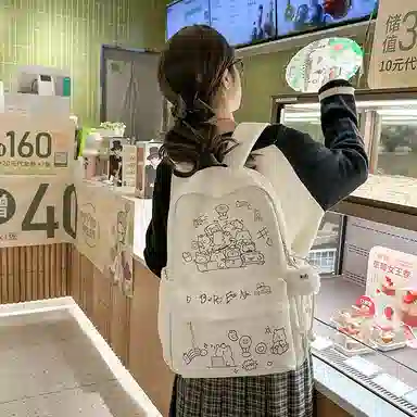 醇龙 可爱涂鸦卡通印花书包轻便休闲小众学生小清新少女背包 尼龙 双肩包 男女同款情侣款 黑色/彩色