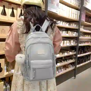 醇龙  尼龙男女通用多色书包大容量学生轻便减负护脊高颜值背包纯色多口袋双肩包