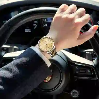 梦特娇 双龙戏珠系列 时尚上班族通勤商务百搭日期显示高级腕表罗马数字 自动机械机芯 精钢表带 国表 男表 白色表盘 学生党运动防水夜光