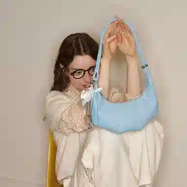 MUVA Small Calf Horn Bag