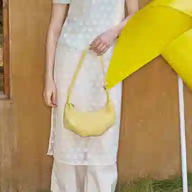 MUVA Small Calf Horn Bag