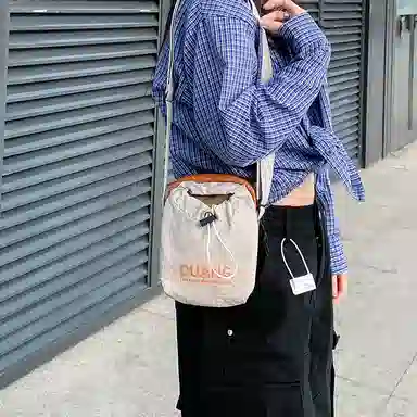 笛贝嘉 韩版抽绳轻便小众时尚个性 尼龙 手机包 男女同款情侣款 多色