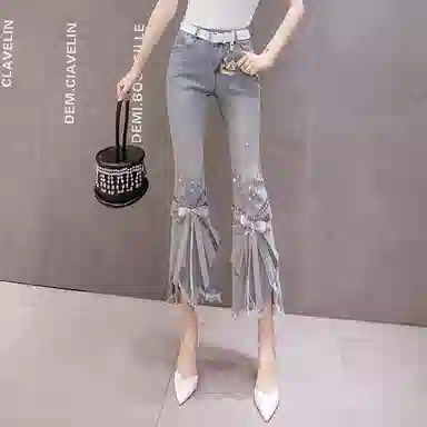 木清清 时尚高腰磨破不规则喇叭裤牛仔裤 女款