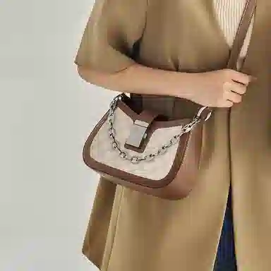 纳兰杜 高级感包包女百搭少女包潮流法棍包个性洋气 牛皮拼合成革 腋下包单肩包斜挎包 女款 棕色/白拼棕