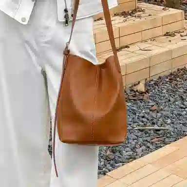 纳兰杜 通勤复古时尚百搭高级感实用 牛皮拼合成革 水桶包斜挎单肩包 迷你 女款 子夜黑/金棕/咖啡色