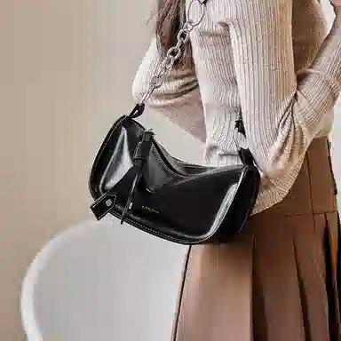 纳兰杜 女包潮流百搭女生包包高级感小众品牌 牛皮 枕头包单肩包斜挎包 中号 女款 子夜黑/棕色