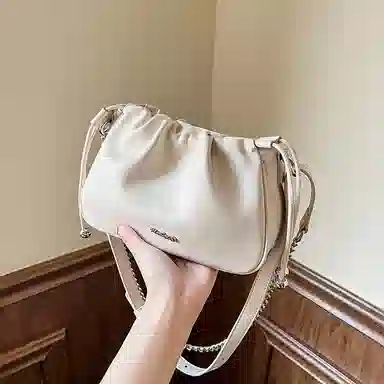 纳兰杜 链条小众百搭潮流少女包包 牛皮 腋下包云朵包斜挎包单肩包 小号 女款 米白色/燕麦色