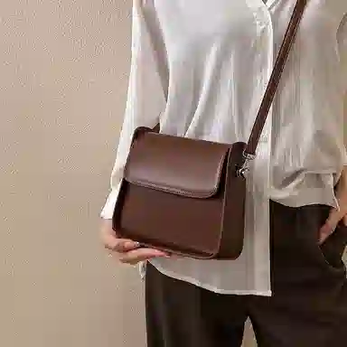 纳兰杜 高级感小众时尚百搭潮流简约通勤真皮品牌女包 牛皮 豆腐包单肩包斜挎包小方包 小号 女款 咖啡色