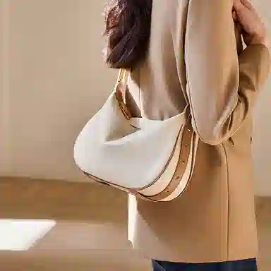 纳兰杜 饺子包女通勤实用高级感百搭潮流女包时尚少女包 牛皮合成革 单肩斜挎包腋下包 大号 女款 米白拼棕