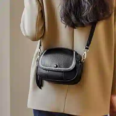 纳兰杜 女士包轻复古高级感百搭小众洋气简约休闲实用女包 牛皮拼合成革 小圆包斜挎单肩包 小号 女款 焦糖棕/夜幕黑/米白色