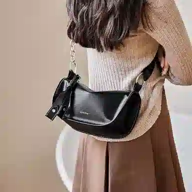 纳兰杜 女包潮流百搭女生包包高级感小众品牌 牛皮 枕头包单肩包斜挎包 中号 女款 子夜黑/棕色