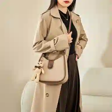 纳兰杜 时尚高级感潮流百搭高颜值设计感 牛皮 水桶包马鞍包斜挎单肩包 女款 米白色