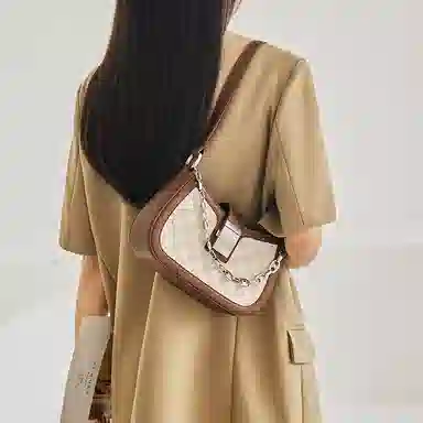 纳兰杜 高级感包包女百搭少女包潮流法棍包个性洋气 牛皮拼合成革 腋下包单肩包斜挎包 女款 棕色/白拼棕