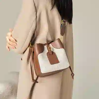 纳兰杜 大容量休闲简约设计抽绳开合 牛皮 水桶包手提单肩包 中号 女款 米白配棕