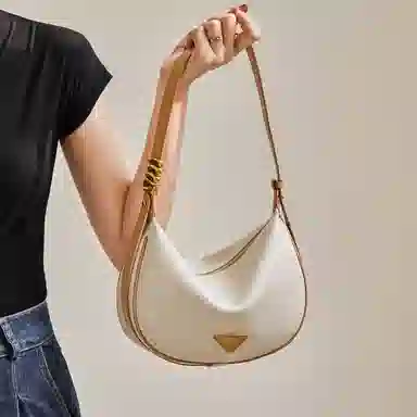 纳兰杜 女包百搭休闲潮流高级质感时尚包包 牛皮拼合成革 饺子包腋下包斜挎单肩包 大号 女款 米白拼杏/焦糖棕/子夜