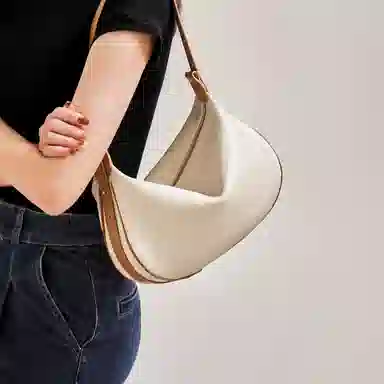 纳兰杜 饺子包女通勤实用高级感百搭潮流女包时尚少女包 牛皮合成革 单肩斜挎包腋下包 大号 女款 米白拼棕