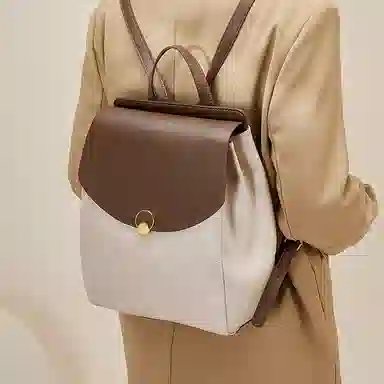 纳兰杜 大容量出行旅游高级感百搭高中生初中生轻便 牛皮拼合成革 背包双肩包 大号 女款 白拼咖色