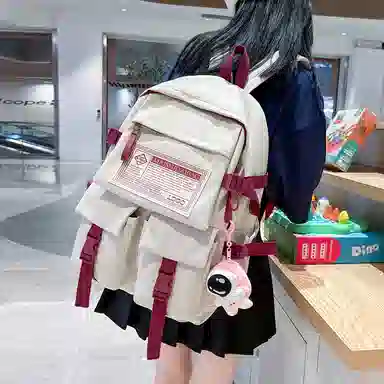 纳兰杜 大容量学生书包轻便潮流通勤双肩包大学生初中生高中生百搭款背包 织物配合成革 电脑包旅行包 大号 女款 米白拼红