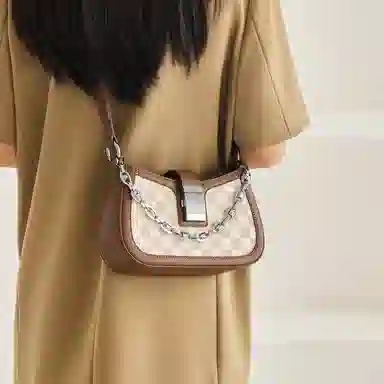 纳兰杜 高级感包包女百搭少女包潮流法棍包个性洋气 牛皮拼合成革 腋下包单肩包斜挎包 女款 棕色/白拼棕