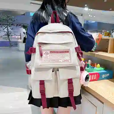 纳兰杜 大容量学生书包轻便潮流通勤双肩包大学生初中生高中生百搭款背包 织物配合成革 电脑包旅行包 大号 女款 米白拼红