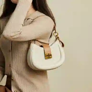 纳兰杜 高级感时尚包包女百搭少女包潮流小众设计感 合成革 马鞍包腋下包斜挎包单肩包 小号 女款 米白拼杏