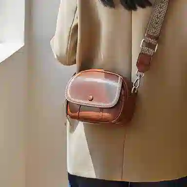 纳兰杜 女士包轻复古高级感百搭小众洋气简约休闲实用女包 牛皮拼合成革 小圆包斜挎单肩包 小号 女款 焦糖棕/夜幕黑/米白色