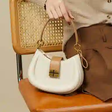 纳兰杜 高级感时尚包包女百搭少女包潮流小众设计感 合成革 马鞍包腋下包斜挎包单肩包 小号 女款 米白拼杏