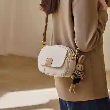 纳兰杜 女包百搭高级感简约潮流小众实用通勤包包 牛皮拼合成革 小圆包斜挎包单肩包 小号 女款 米白拼杏/子夜黑拼棕/大象灰拼棕