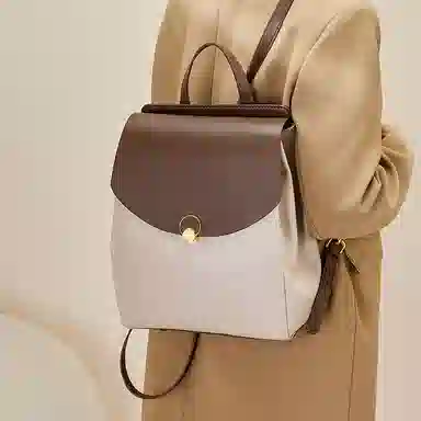 纳兰杜 大容量出行旅游高级感百搭高中生初中生轻便 牛皮拼合成革 背包双肩包 大号 女款 白拼咖色