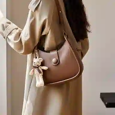 纳兰杜 时尚高级感潮流百搭高颜值设计感 牛皮 水桶包马鞍包斜挎单肩包 女款 米白色