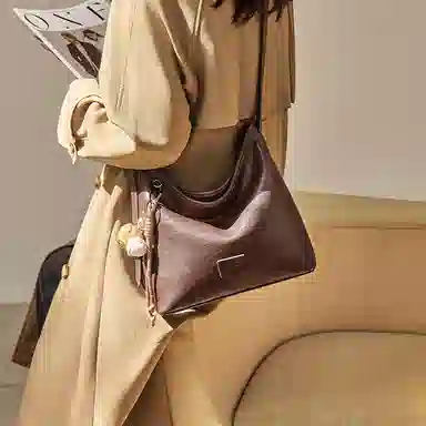 纳兰杜 复古小众设计单肩包高级质感休闲百搭女包 织物 水桶包腋下包斜挎包 大号 女款 植鞣咖色