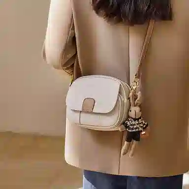 纳兰杜 女包百搭高级感简约潮流小众实用通勤包包 牛皮拼合成革 小圆包斜挎包单肩包 小号 女款 米白拼杏/子夜黑拼棕/大象灰拼棕