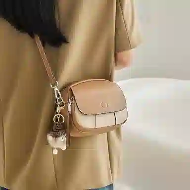 纳兰杜 包包女包百搭时尚小众品牌实用精致 牛皮 小圆包斜挎包单肩包 小号 女款 杏拼奶昔白/咖拼奶昔白