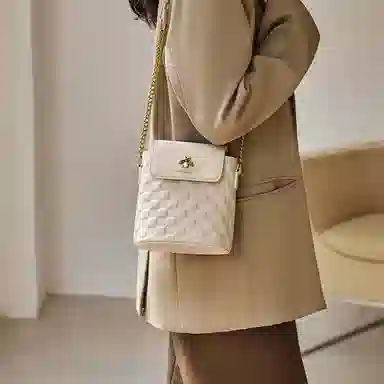 纳兰杜 女包小众优雅时尚链条包百搭通勤高级感个性精致实用 头层牛皮 斜挎包水桶包 小号 女款 米白色/大象灰