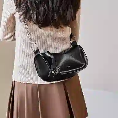 纳兰杜 女包潮流百搭女生包包高级感小众品牌 牛皮 枕头包单肩包斜挎包 中号 女款 子夜黑/棕色