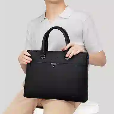 马莎兰缇 纯色时尚高端大容量简约百搭通勤 牛皮 电脑包手提包 常规 男款 黑色