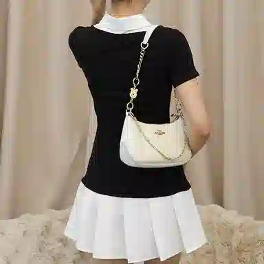 Disney COACH Teri 25