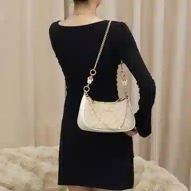 Disney COACH Teri 24