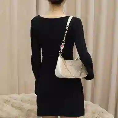 Disney COACH Teri 24