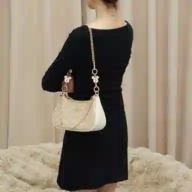 Disney COACH Teri 24