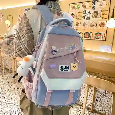 尼格尔大容量双肩背包休闲校园女生尼龙双肩包小学生初中生学生上课书包女多色