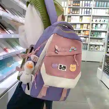 尼格尔大容量双肩背包休闲校园女生尼龙双肩包小学生初中生学生上课书包女多色