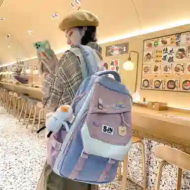 尼格尔大容量双肩背包休闲校园女生尼龙双肩包小学生初中生学生上课书包女多色