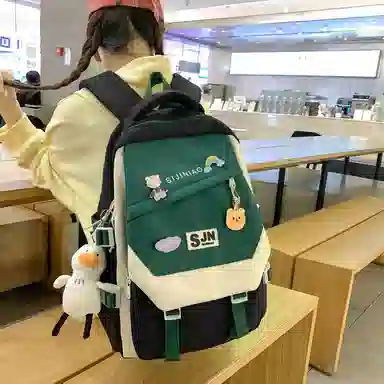 尼格尔大容量双肩背包休闲校园女生尼龙双肩包小学生初中生学生上课书包女多色