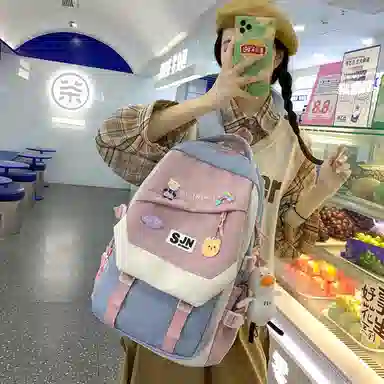 尼格尔大容量双肩背包休闲校园女生尼龙双肩包小学生初中生学生上课书包女多色