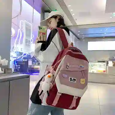 尼格尔大容量双肩背包休闲校园女生尼龙双肩包小学生初中生学生上课书包女多色