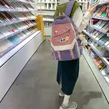 尼格尔大容量双肩背包休闲校园女生尼龙双肩包小学生初中生学生上课书包女多色