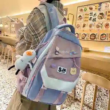 尼格尔大容量双肩背包休闲校园女生尼龙双肩包小学生初中生学生上课书包女多色